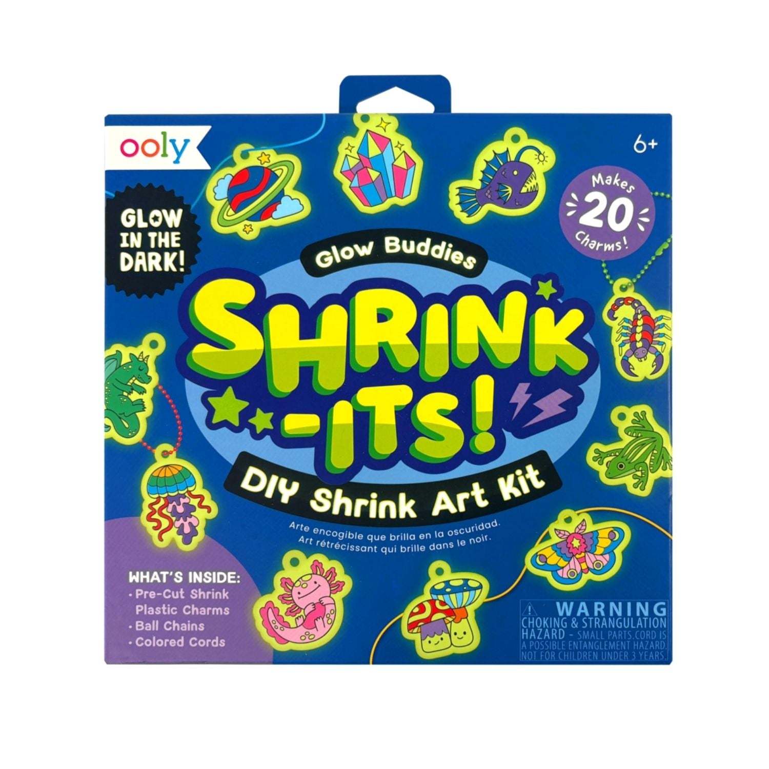 The Shrink-Its! Glow-in-the-Dark Buddies Art Kit featuring vibrant packaging, the shrink sheets, and colourful keychain accessories.