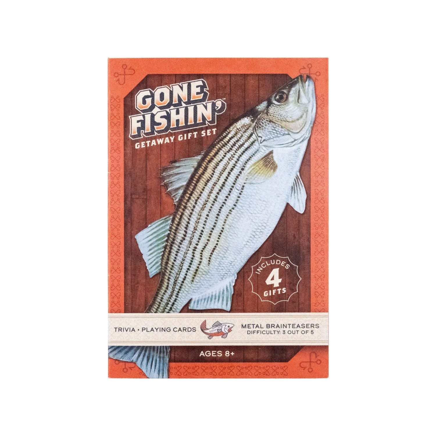 The Gone Fishin’ Getaway Gift Set displayed in its stylish, book-style case, showing the metal puzzles and card decks neatly arranged inside.