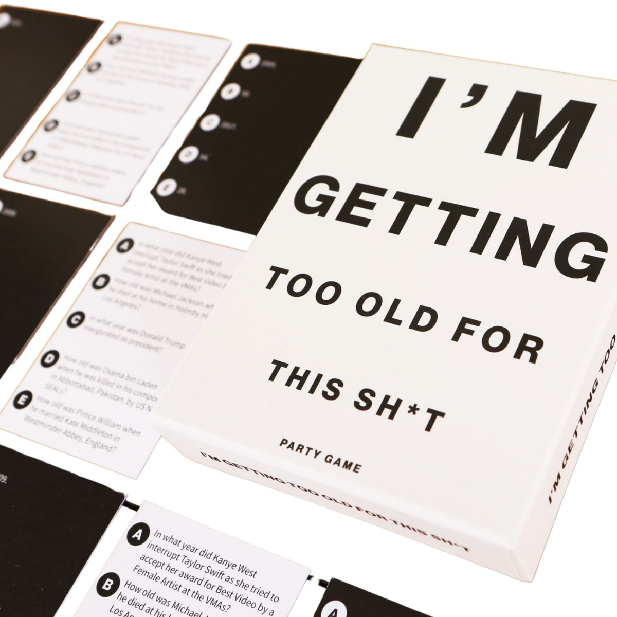 Card game packaging with text 'I'm Getting Too Old For This Sh*t' with game cards in background