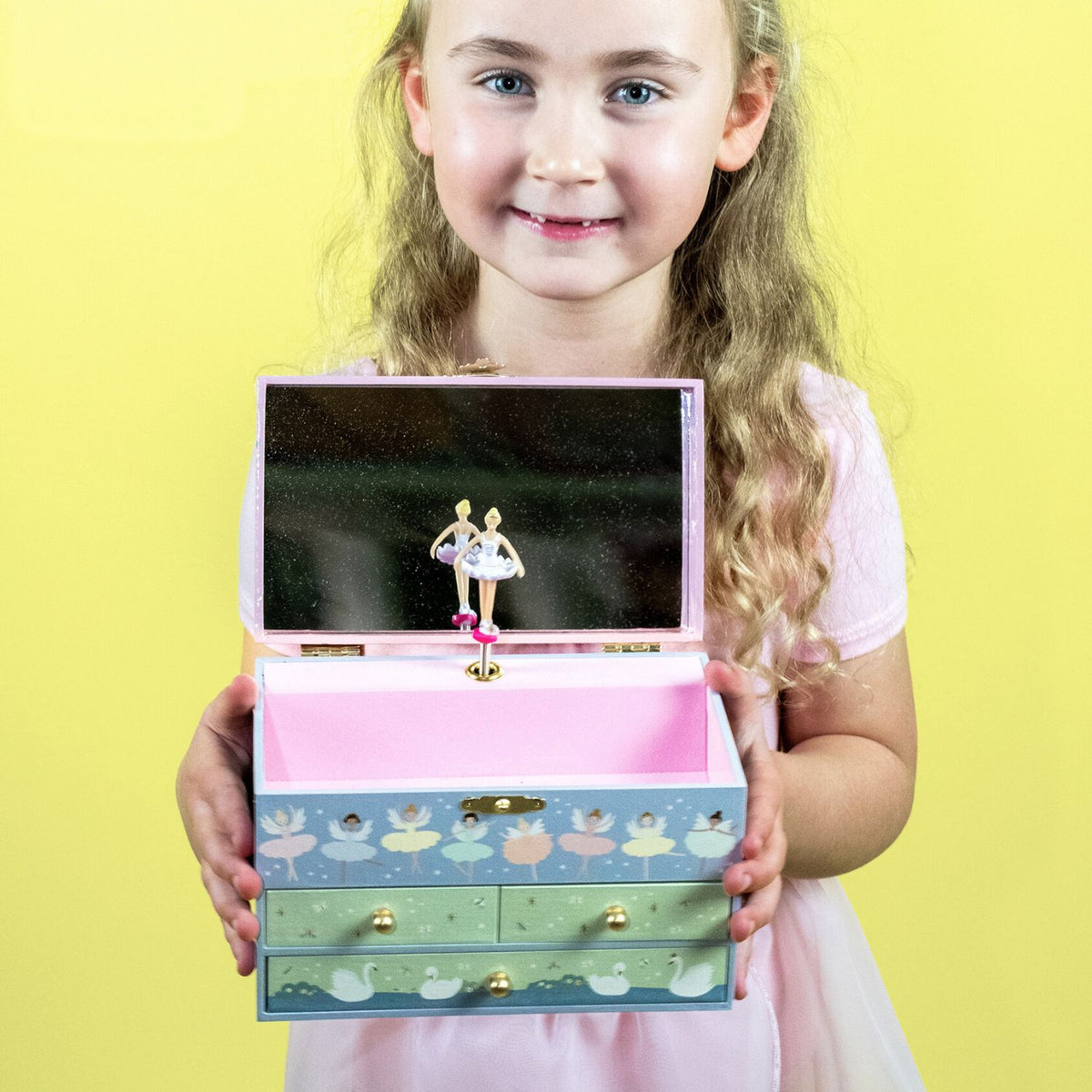 front-facing shot of the Enchanted jewellery box with its pull-out drawers open, displaying space for necklaces, rings, and small keepsakes.