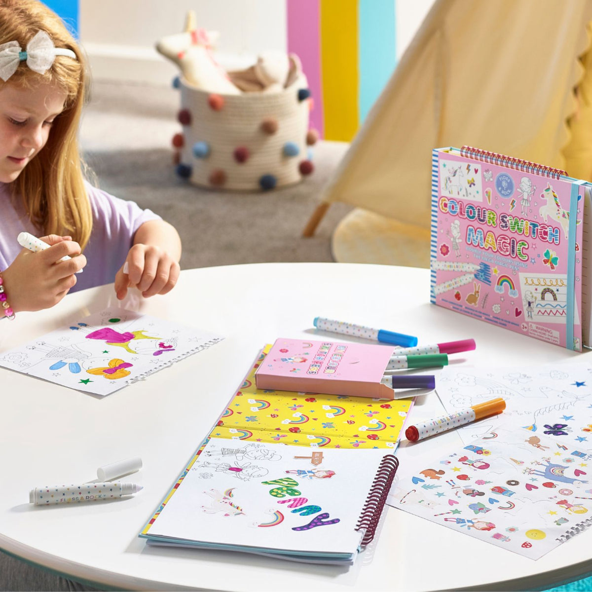 The ultimate travel companion! This ring-bound activity pad features doodle pages, colouring, writing prompts, and stickers. The elastic closure keeps everything tidy for road trips and flights.