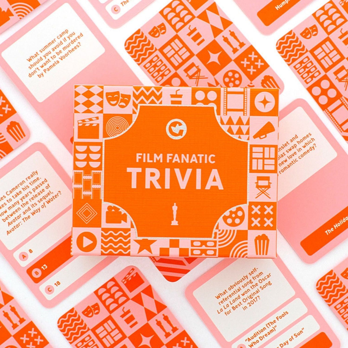 Collection of 'Film Fanatic Trivia' cards with orange and pink design.