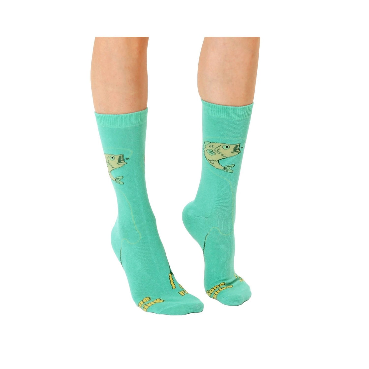 Teal socks with fish design worn by a person on a white background