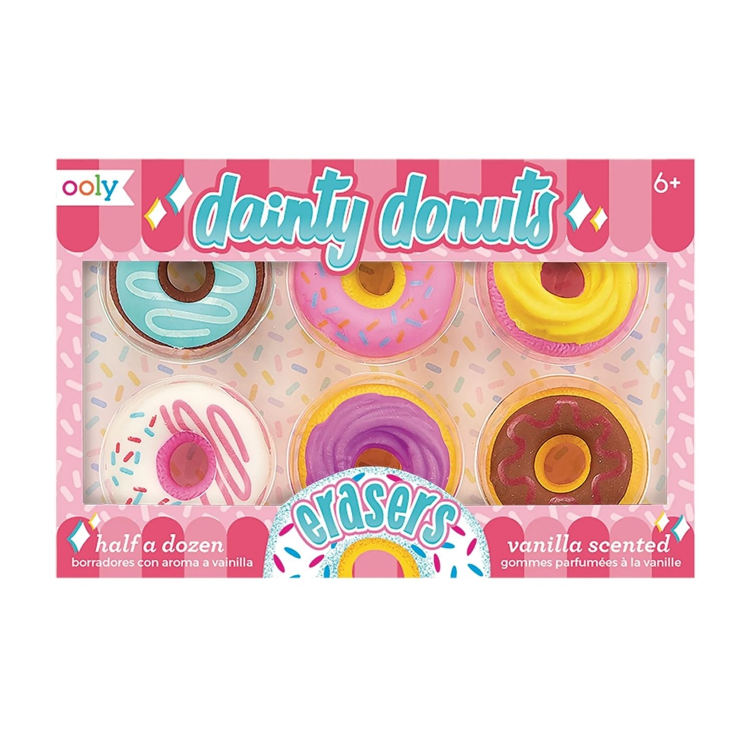 Packaging of ooly dainty donuts erasers with colorful donut illustrations on a pink background.