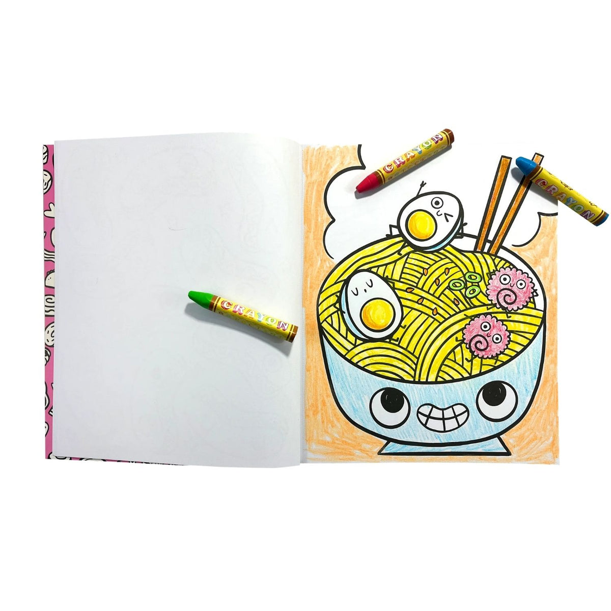Coloring book with a cartoon bowl of ramen and colouring crayons on a white background