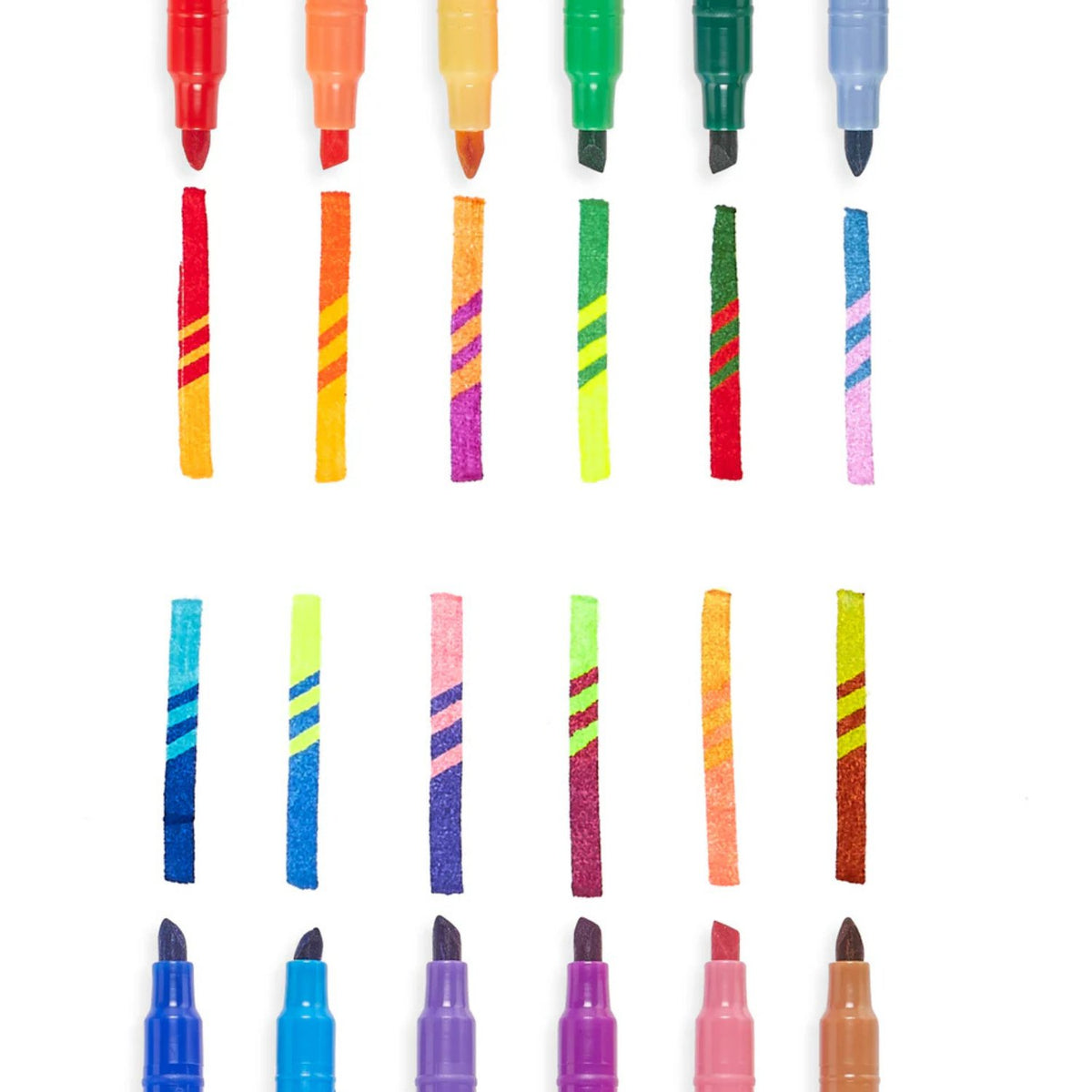 All 12 markers arranged in a row to show the rainbow of base colours and magic switch colours