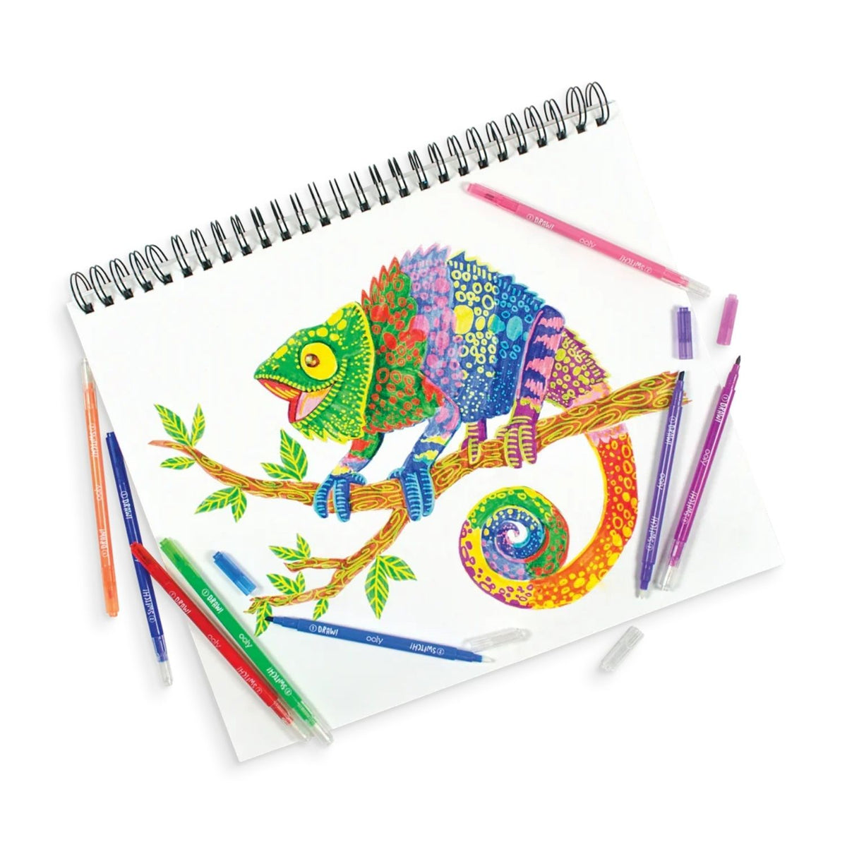 Sketch book with a chameleon drawing using the Switch-eroo Colour-Changing Markers to make the patterns and small details of the lizard stand out.