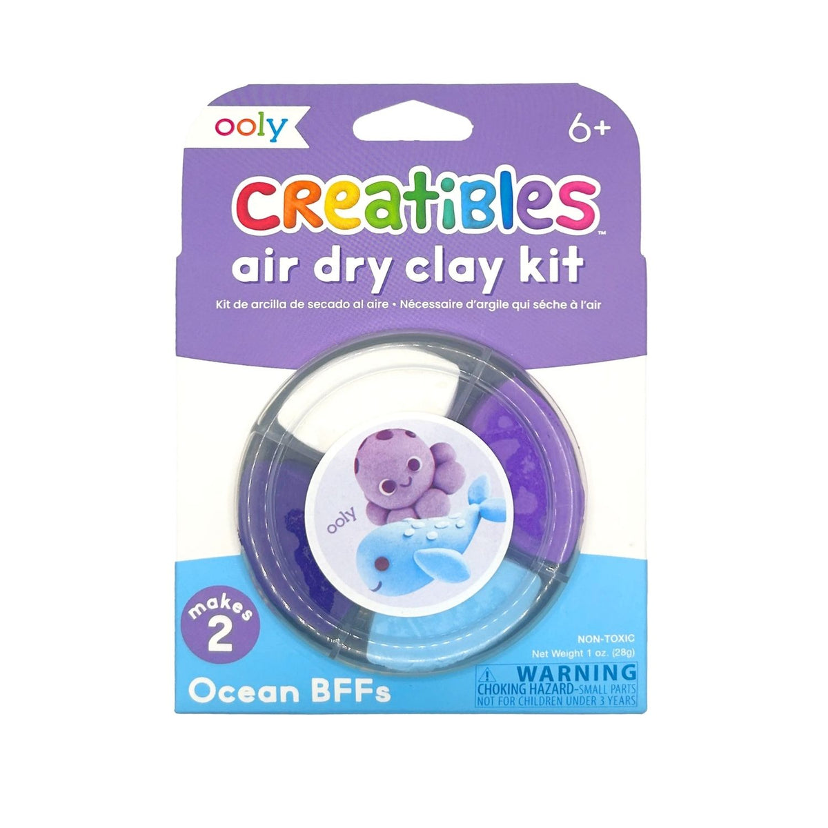 The Sea Buddies Air Dry Clay kit in its compact, reusable storage tub, featuring bright labels and illustrations of the purple octopus and blue whale.