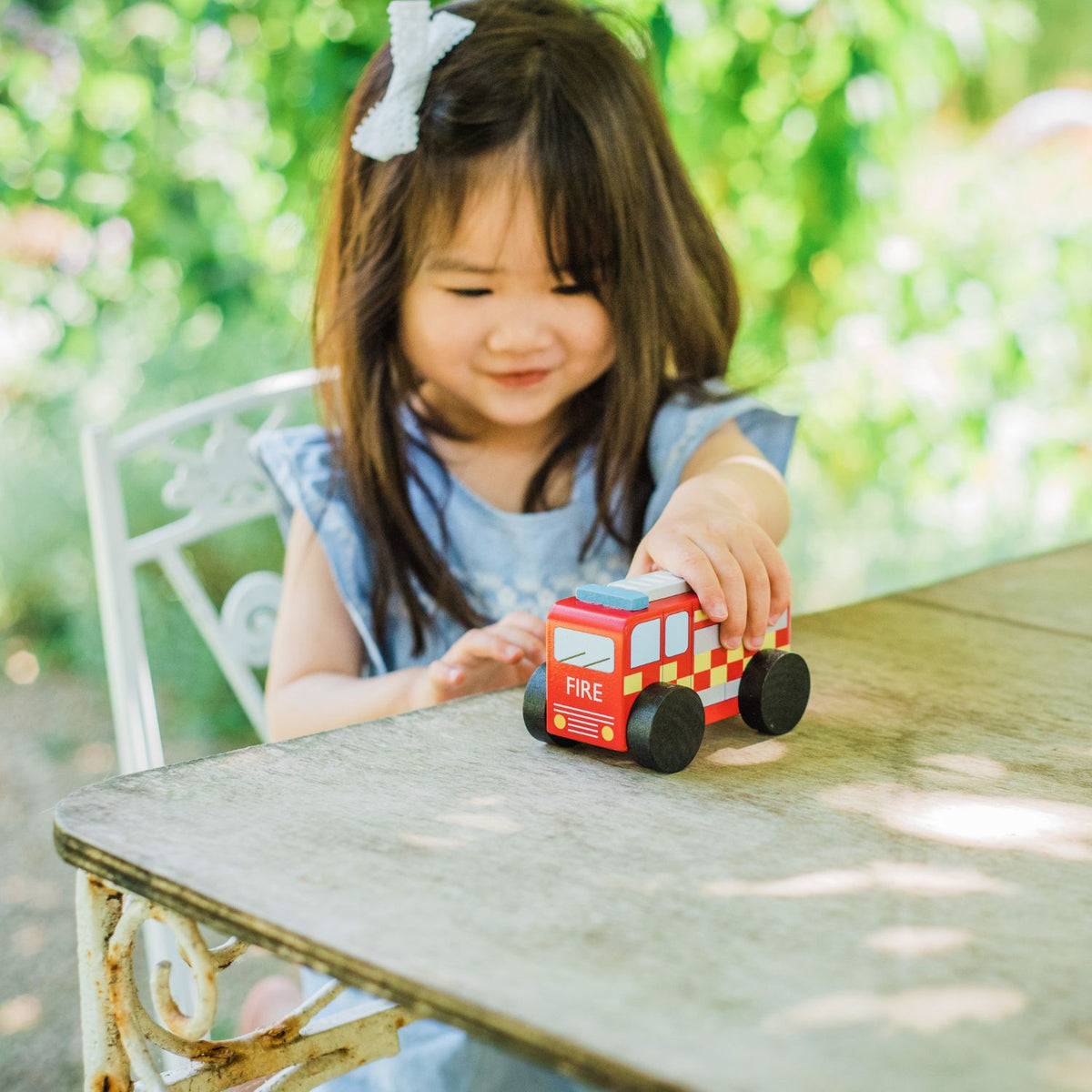Plastic-free firefighting fun! Responsibly crafted from 100% FSC-certified wood with child-safe paints. Built durable for active toddlers and preschool play.