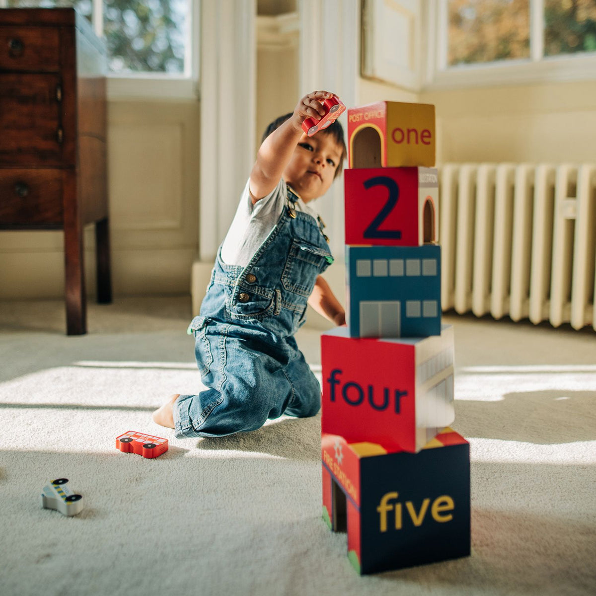Plastic-free early learning fun! Responsibly crafted from 100% FSC-certified wood with child-safe paints. Builds size sequencing, balance, and motor skills.