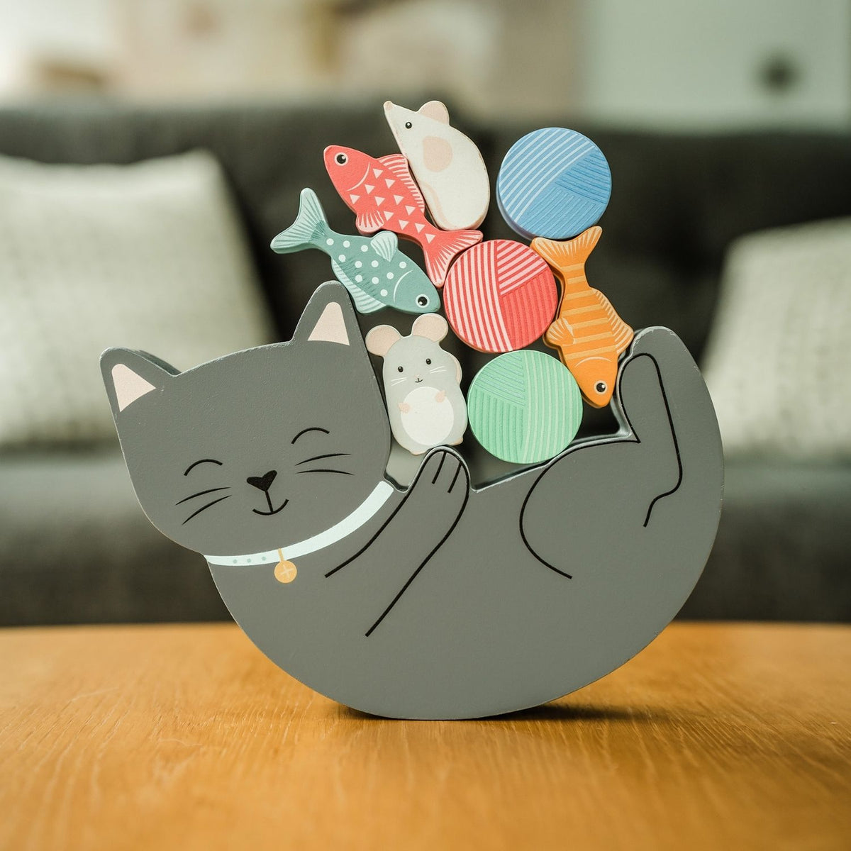 A charming wooden balance puzzle that doubles as storytelling props. Crafted from durable wood with non-toxic paints. The perfect gift for young cat lovers.