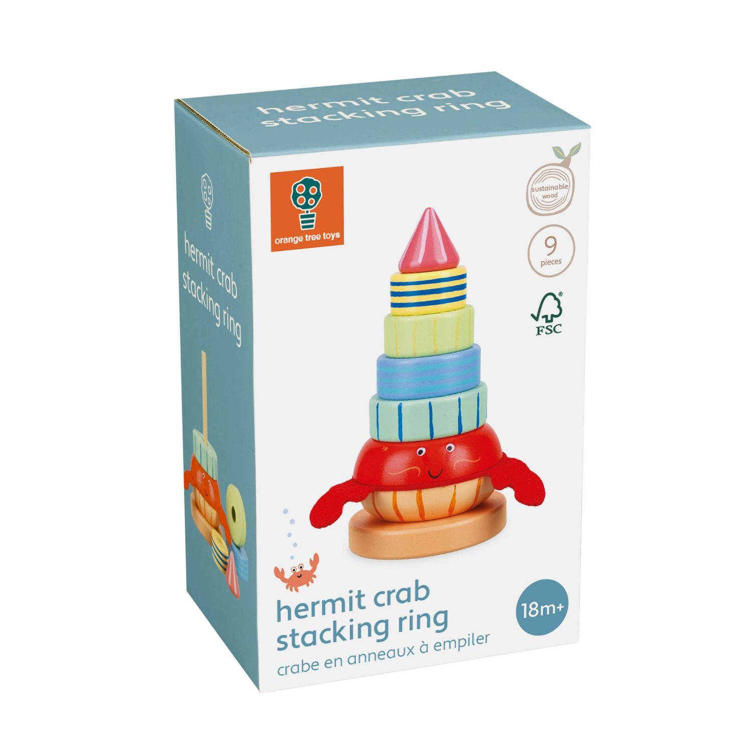 A product packaging shot featuring the Orange Tree Toys Sea Life Hermit Crab Stacking Toy fully assembled, showcasing the brightly painted wooden rings stacked by size on the central base topped with a cheerful crab face.