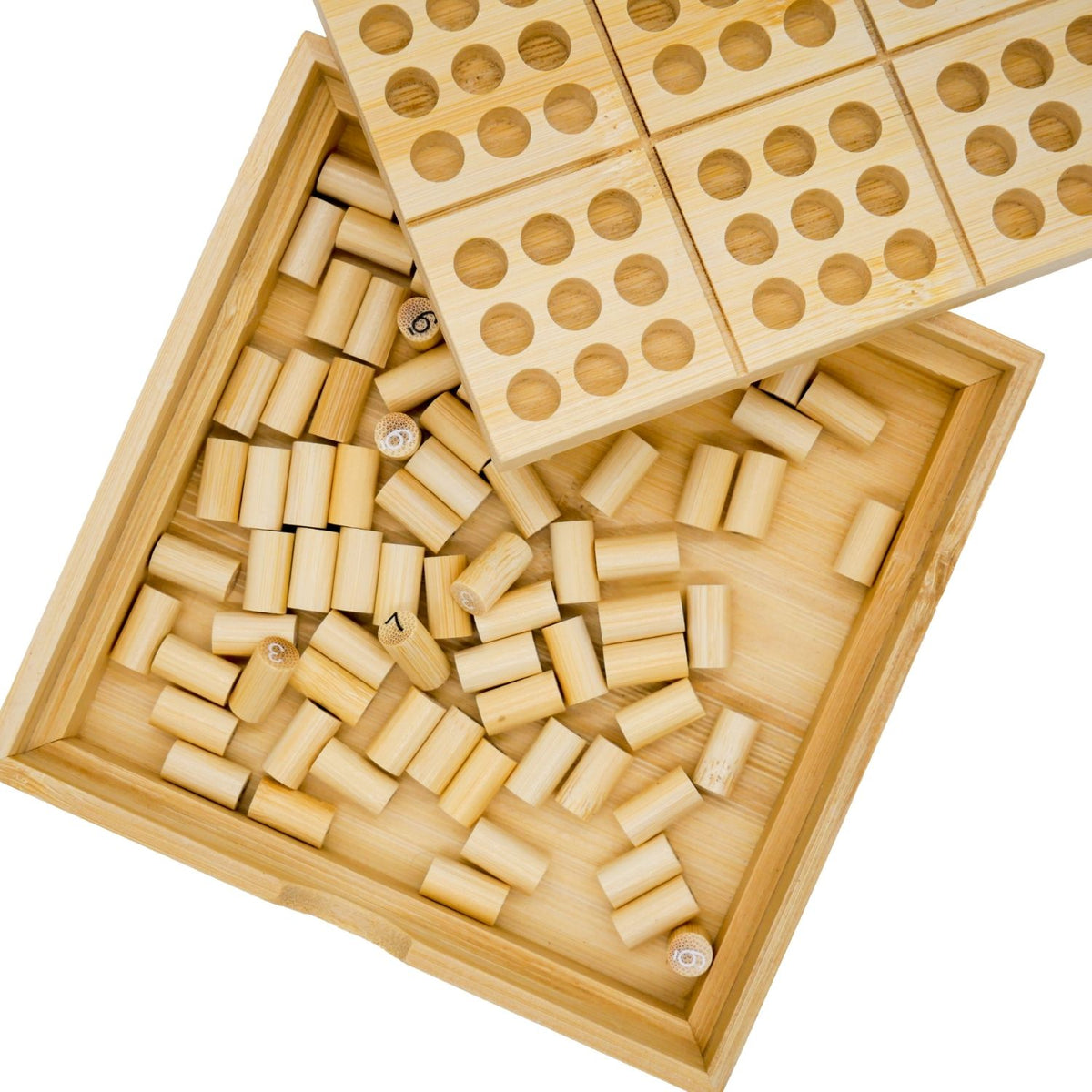A close-up of the smooth, laser-engraved bamboo number tiles and the starter puzzle cards included with the set for ages eight and up.